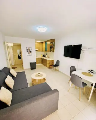 Télévision ou salle de divertissement dans l'établissement Square central