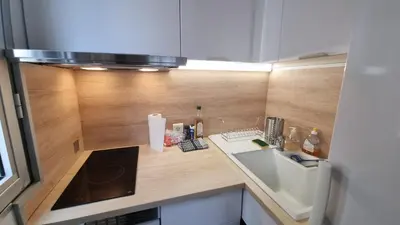 Cuisine ou kitchenette dans l'établissement appartement plage de la Salis