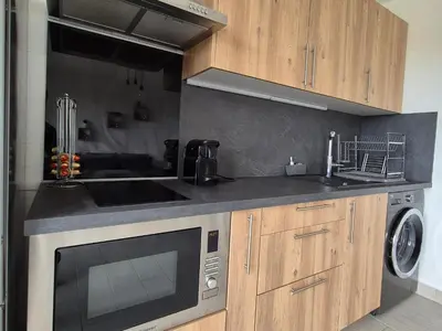 Cuisine ou kitchenette dans l'établissement Superbe T2 - 200m de la mer - Piscine - Parking