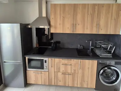 Cuisine ou kitchenette dans l'établissement Superbe T2 - 200m de la mer - Piscine - Parking