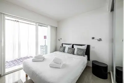 Un ou plusieurs lits dans un hébergement de l'établissement Bright apartment near the Croisette - Cannes