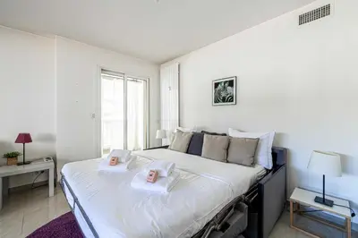 Un ou plusieurs lits dans un hébergement de l'établissement Bright apartment near the Croisette - Cannes