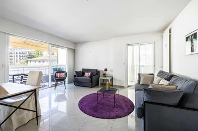 Coin salon dans l'établissement Bright apartment near the Croisette - Cannes