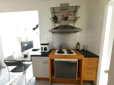 Cuisine ou kitchenette dans l'établissement Palais Porte de France Apartment With Air conditionner