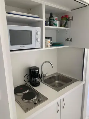 Cuisine ou kitchenette dans l'établissement Studio Cannes bord de mer