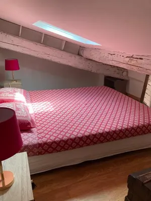 Un ou plusieurs lits dans un hébergement de l'établissement studio avec chambre en mezzanine