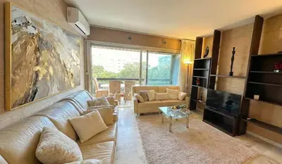 Coin salon dans l'établissement B038 Spacieux Appartement proche Croisette parking