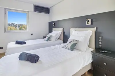 Un ou plusieurs lits dans un hébergement de l'établissement DUPLEX VILLA LES PINS 89m2 et terrasse 30m2