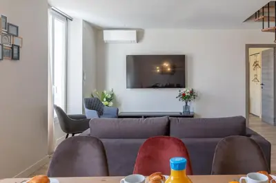Coin salon dans l'établissement BRP Cannes Center,Top floor Luxurious house,8 bed