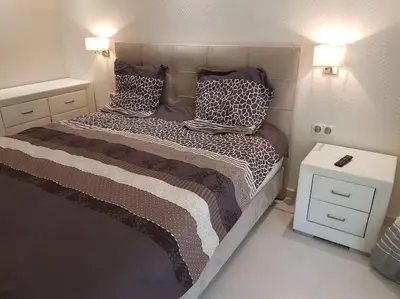 Un ou plusieurs lits dans un hébergement de l'établissement Cannes appartement 3 chambres - 8D
