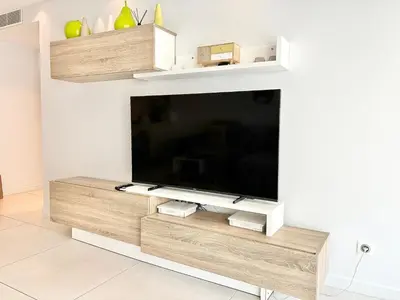 Télévision ou salle de divertissement dans l'établissement Cannes appartement 3 chambres - 8D