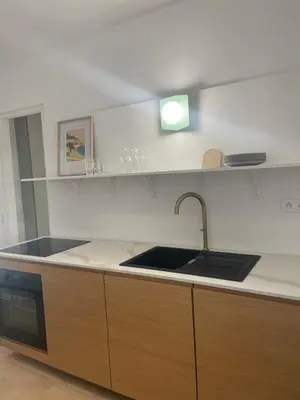 Cuisine ou kitchenette dans l'établissement La maison by Simone T3