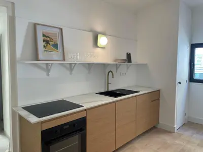 Cuisine ou kitchenette dans l'établissement La maison by Simone T3