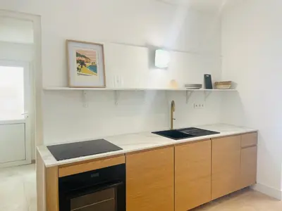 Cuisine ou kitchenette dans l'établissement La maison by Simone T3