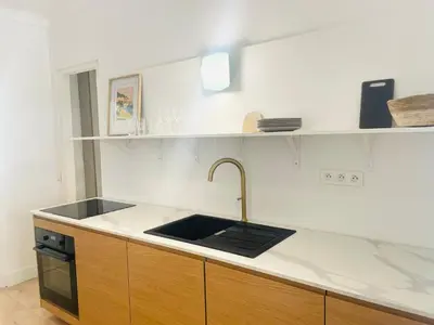 Cuisine ou kitchenette dans l'établissement La maison by Simone T3