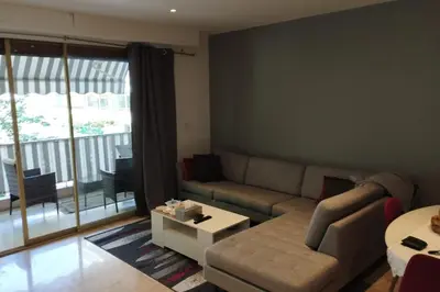 Coin salon dans l'établissement Air-conditioned Apartment of 90 m2 only 200 meters away from the Croisette