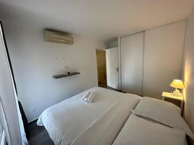 Un ou plusieurs lits dans un hébergement de l'établissement C058 Bel appartement spacieux terrasse Centre