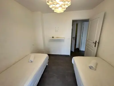 Un ou plusieurs lits dans un hébergement de l'établissement C058 Bel appartement spacieux terrasse Centre