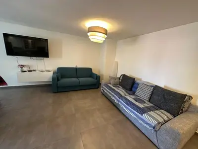 Coin salon dans l'établissement C058 Bel appartement spacieux terrasse Centre