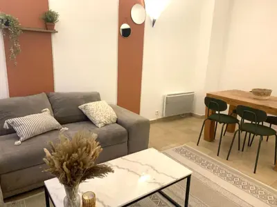 Coin salon dans l'établissement La Maison By Simone T4