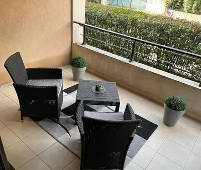 Coin salon dans l'établissement Appartement 3 Etoiles centre moderne terrasse piscine parking