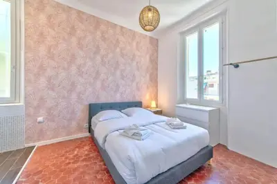 Un ou plusieurs lits dans un hébergement de l'établissement Maison Martel