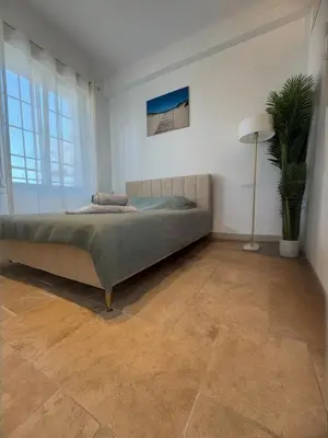 Un ou plusieurs lits dans un hébergement de l'établissement Appartement T3 grand standing à Juan Les Pins