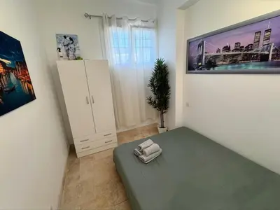 Un ou plusieurs lits dans un hébergement de l'établissement Appartement T3 grand standing à Juan Les Pins
