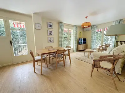 Coin salon dans l'établissement 63m2 Grande Terrasse, Clim