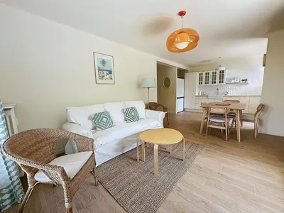 Coin salon dans l'établissement 63m2 Grande Terrasse, Clim