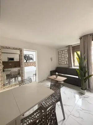 Coin salon dans l'établissement Residence Graziella Appartement 109