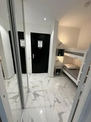 Un ou plusieurs lits dans un hébergement de l'établissement Residence Graziella Appartement 109