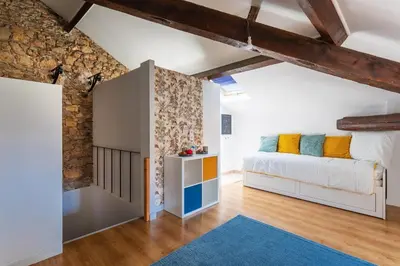 Un ou plusieurs lits dans un hébergement de l'établissement maison de ville La Fontaine BAu4