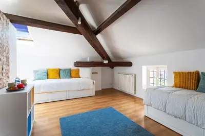 Un ou plusieurs lits dans un hébergement de l'établissement maison de ville La Fontaine BAu4