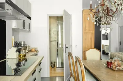 Cuisine ou kitchenette dans l'établissement Immogroom - T4 - Center - 8 min from Palais