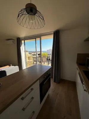 Cuisine ou kitchenette dans l'établissement ROOFTOP vue mer