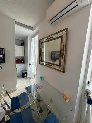 Un ou plusieurs lits dans un hébergement de l'établissement Studio Cannes Carré d'Or