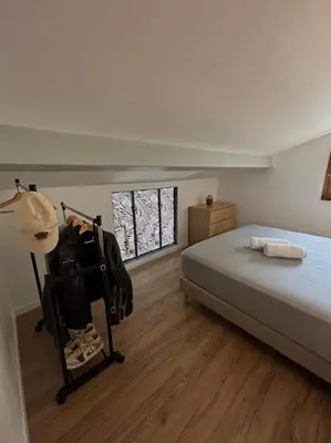Un ou plusieurs lits dans un hébergement de l'établissement L'Esmeralda - Maisonnette de vacances