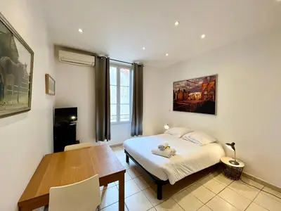 Un ou plusieurs lits dans un hébergement de l'établissement Viva Riviera Residence Rue Florian close Croisette