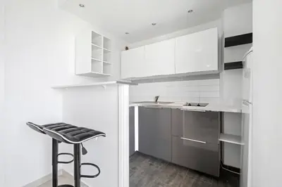 Cuisine ou kitchenette dans l'établissement Studio Velasquez - Welkeys