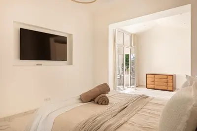 Un ou plusieurs lits dans un hébergement de l'établissement Villa California Cannes Private Pool