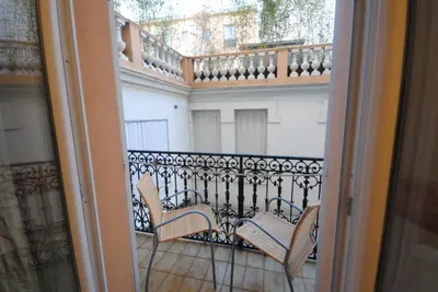 Balcon ou terrasse dans l'établissement en centre ville magnifique pied a terre ran44