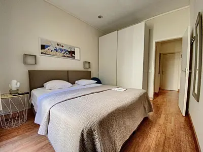 Un ou plusieurs lits dans un hébergement de l'établissement en centre ville magnifique pied a terre ran44