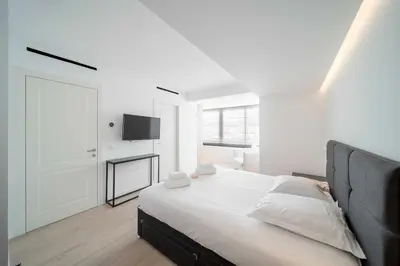 Un ou plusieurs lits dans un hébergement de l'établissement Charming oasis with terrace 4 BD- 8P - Cannes
