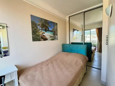 Un ou plusieurs lits dans un hébergement de l'établissement Cannes proche Croisette - 2 pièces au calme avec terrasse