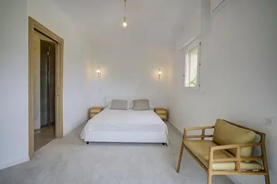 Un ou plusieurs lits dans un hébergement de l'établissement Twin Luxurious Villas 8 BR Pool in Vallauris