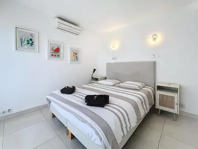 Un ou plusieurs lits dans un hébergement de l'établissement 57m2 - 2 chambres, terrasse, Croisette-Martinez