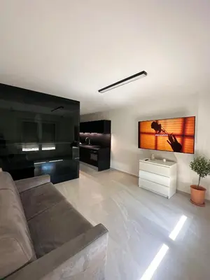 Coin salon dans l'établissement Appartement Design élégant