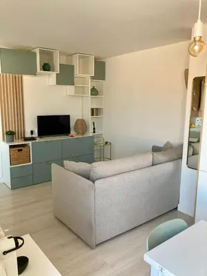 Télévision ou salle de divertissement dans l'établissement Havre cosy et familial, garage, centre ville, dans la cité des Potiers