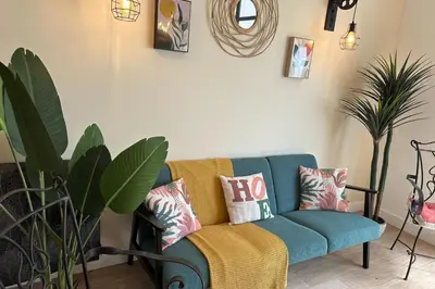Coin salon dans l'établissement Spacious duplex near the city center of Cannes